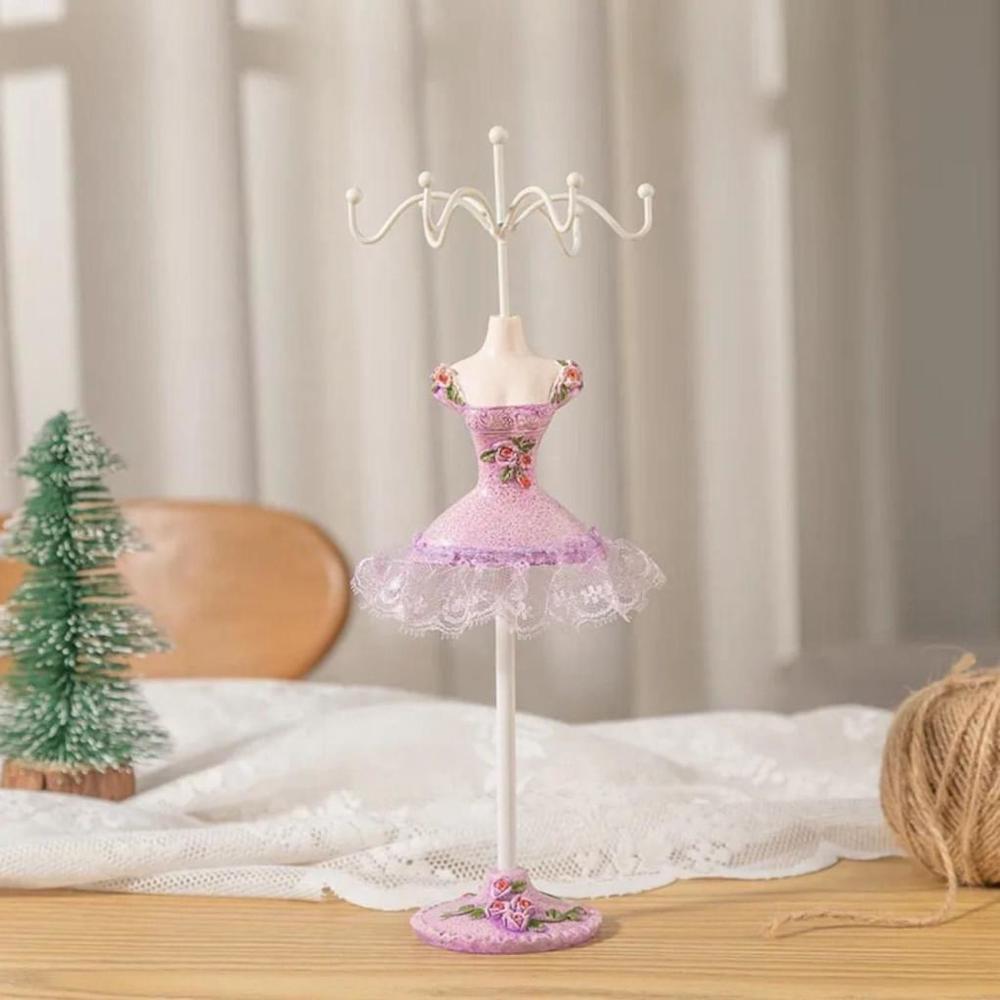 Rotating Jewelry Rack In Purple Dress